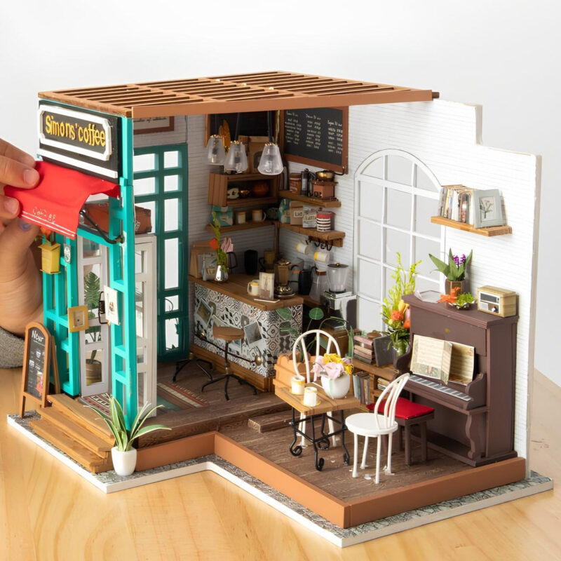 Sanftheit und Kaffee Miniatur Haus